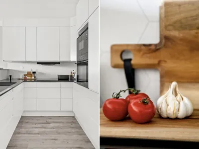 Moderne, stilrent kjøkken i hvitt, med sorte detaljer og benkeplate fra Nerostein